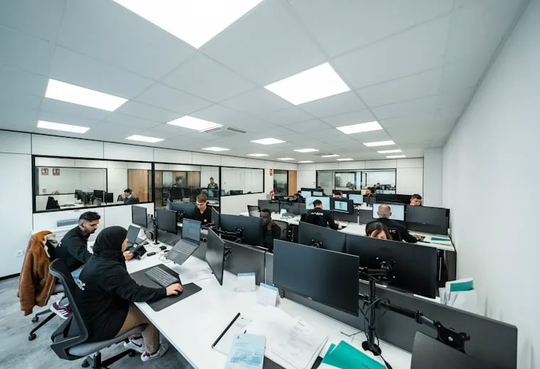 Software team working at computers in an open office